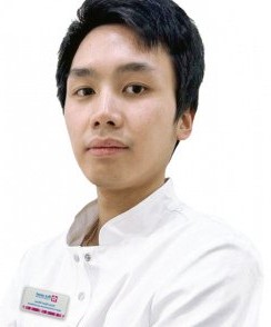 Чинь Куок Минь стоматолог