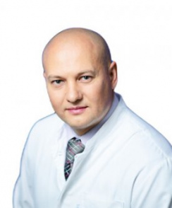 Толмах Роман Евгеньевич хирург