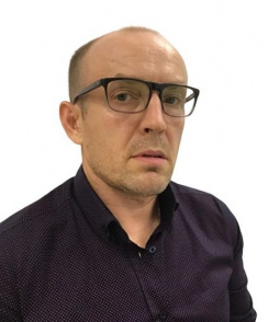 Карнаев Евгений Артурович стоматолог
