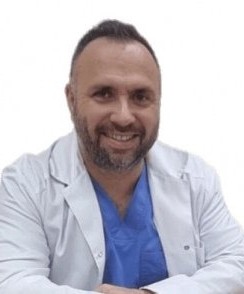 Воложин Григорий Александрович стоматолог